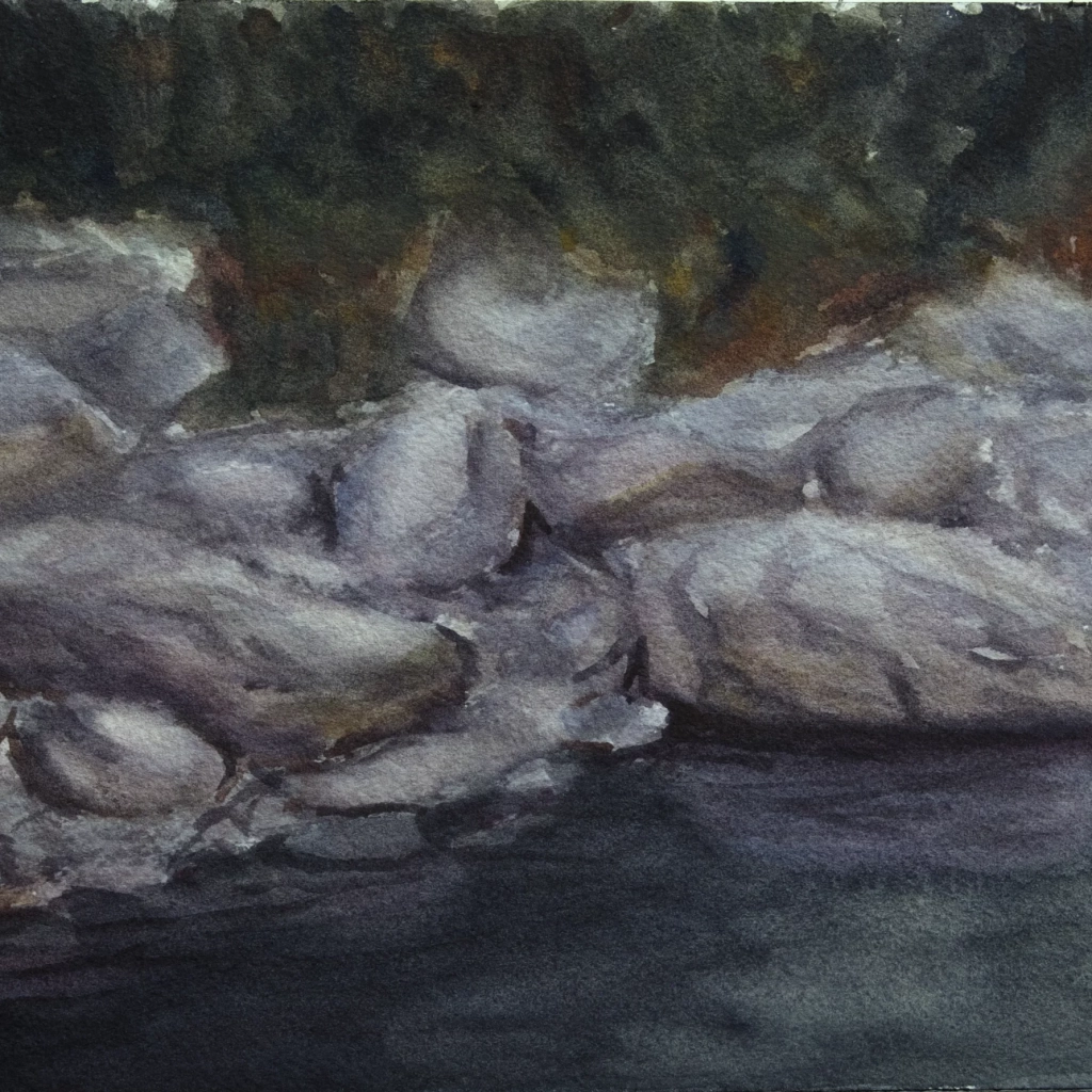 Watercolor sketch of rocks with a lake